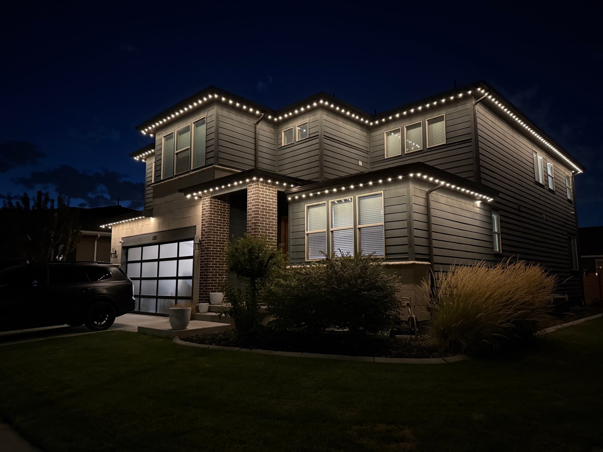 Home with permanent LED lights set to warm white mode at night