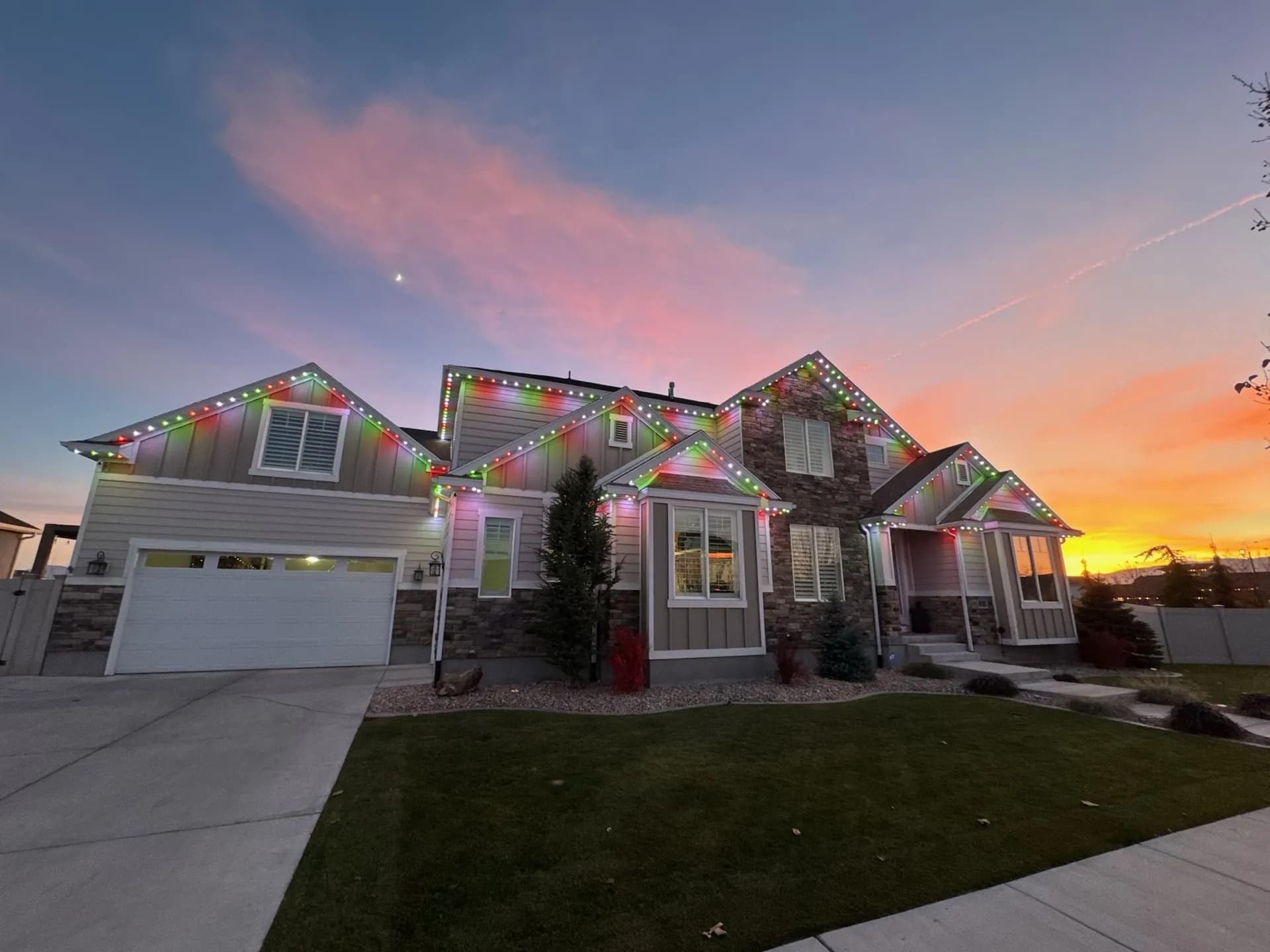 Residential home with professional permanent LED lighting at night
