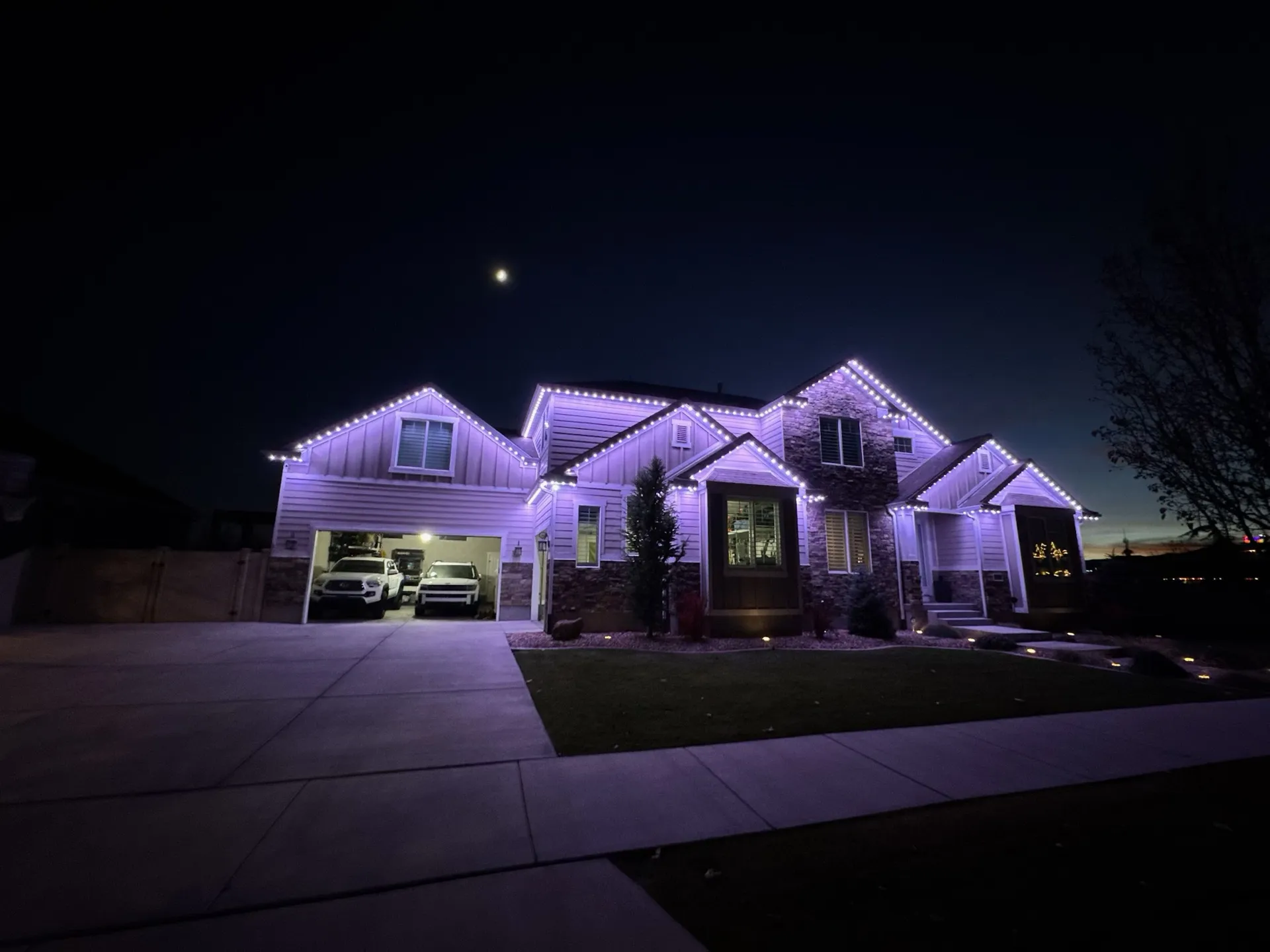 Home with permanent LED lighting at twilight