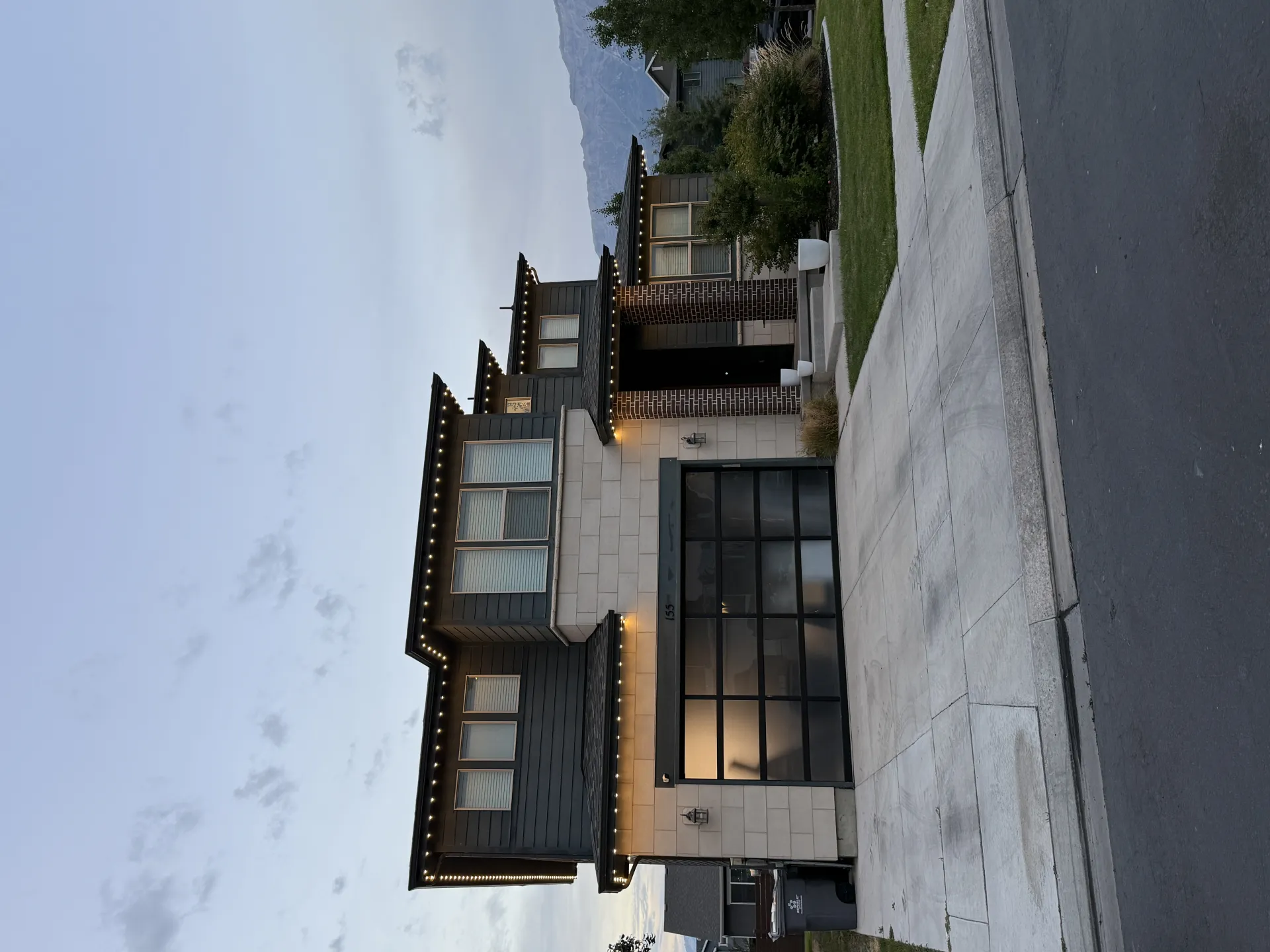 Utah home with outdoor patio lighting at night